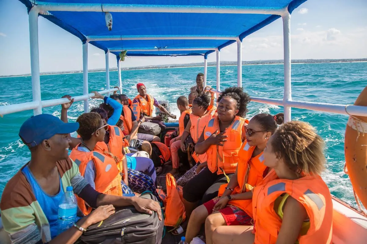 Passengers wearing life jackets during a Watamu glass-bottom boat trip